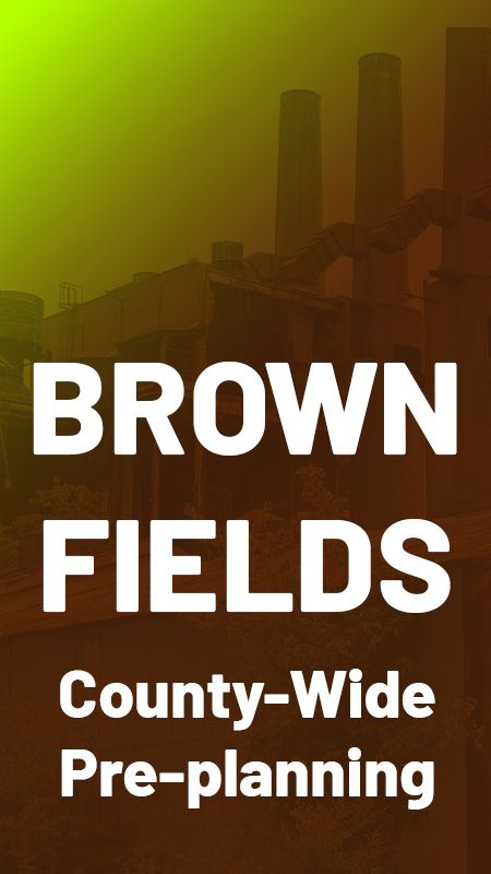 Brownfields text on dark brown overlayed on old industrial building